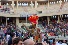 One of the border guards asking people to sit