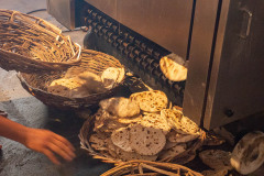 Collecting the bread from the machine